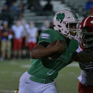 Notre Dame quarterback Anthony Sayles (7) tries to break a tackle. Worsom Robinson/For the Sun-Times.