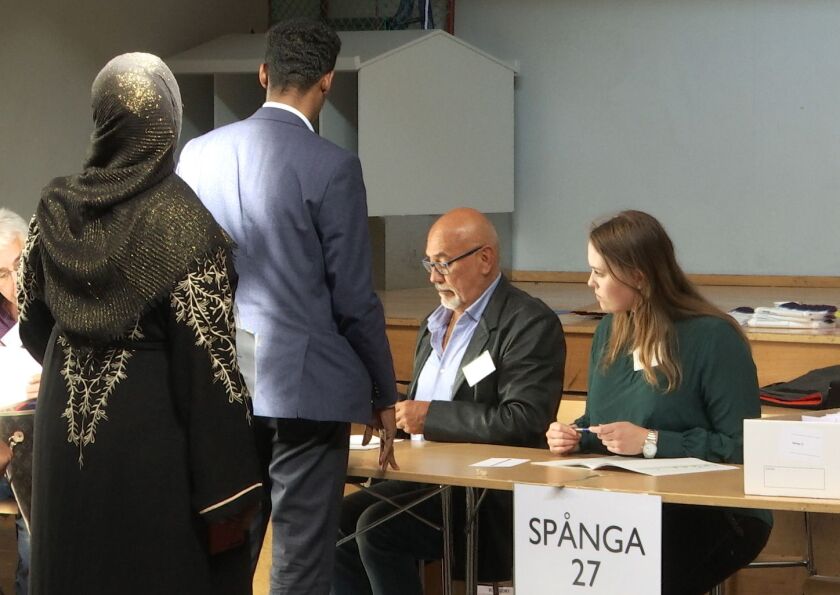 People arrive to vote in Stockholm, Sweden on Sunday. | Pietro De Cristofaro/Associated Press