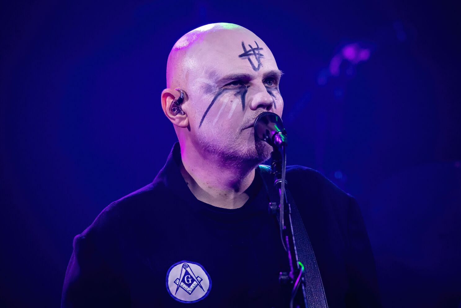 Smashing Pumpkins band members performing live in 2025