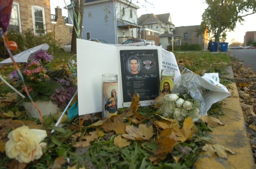 A makeshift memorial on Oct. 25, 2006, marks where Maywood police Officer Thomas Wood was gunned down. | Sun-Times files