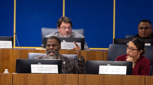 School board member Che "Rhymefest" Smith speaks against a change to the school district's proposed budget.