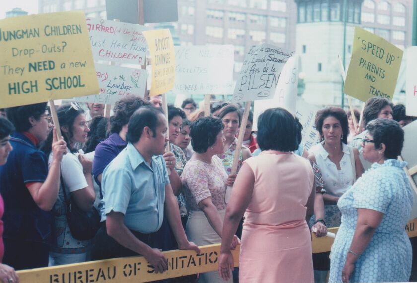Inez Loredo (right, in blue dress) with parents and community members protesting for the creation of a new high school for Pilsen, what would become Benito Juarez Community Academy. | Facebook