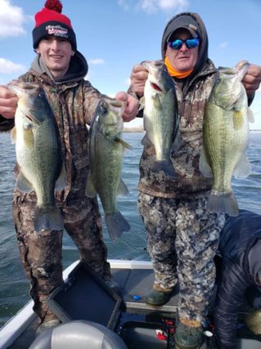 Chaser and Jimmy Ellison with good largemouth bass on opening day at Braidwood Lake. Provided photo