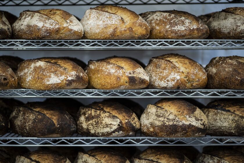 Spence sourdough loaves are cooled in the kitchen at Publican Quality Bread.