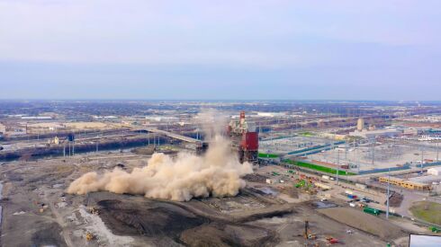 The collapse of a nearly 400-feet-tall smokestack at the former Crawford coal plant in Little Village spewed a massive dust cloud that covered homes, yards and cars.