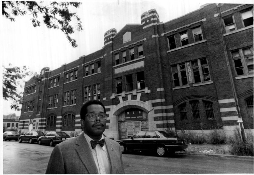 Harold Lucas outside the former Eighth Regiment Armory building at 35th Street and Giles Avenue. The nation’s first armory built for a Black regiment, it’s now home to the Chicago Military Academy.