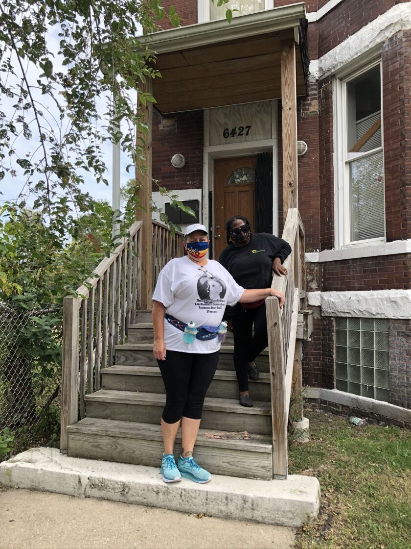 Mary Lu Seidel of Preservation Chicago, and Naomi Davis, founder and CEO of Blacks In Green, stand on the front porch of the Emmett Till and Mamie Till-Mobley House, 6427 S St. Lawrence Ave. in West Woodlawn. Preservation Chicago spearheaded the years-long effort to save the building that Blacks in Green has purchased to turn it into a museum.