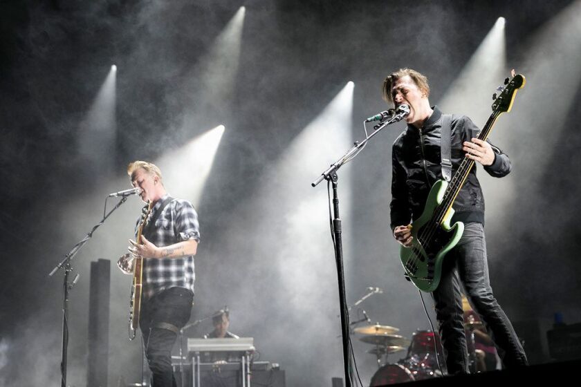<br>Queens of the Stone Age performs on day two of Riot Fest in Douglas Park, Sept. 16, 2017. | Ashlee Rezin/Sun-Times