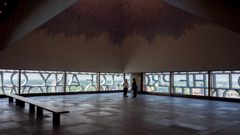The Nelson Mandela Sky Room is on the top floor of the Museum Tower, with words from Obama's 2015 speech "You Are America" wrapping the south and west upper portions of the building.