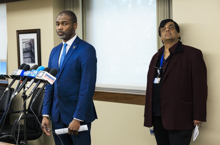 State Rep. La Shawn K. Ford (left) listens to a question alongside Resilience Healthcare CEO Manoj Prasad during press conference Wednesday to answer questions about the conditions at West Suburban Medical Center in Oak Park.