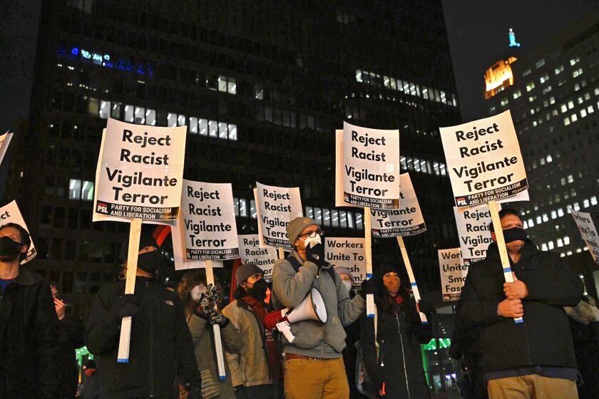 Protesters gather at Federal Plaza in the Loop Friday night, Nov. 19, 2021 after the verdict was reached in the trial of Kyle Rittenhouse in Kenosha, Wisc.