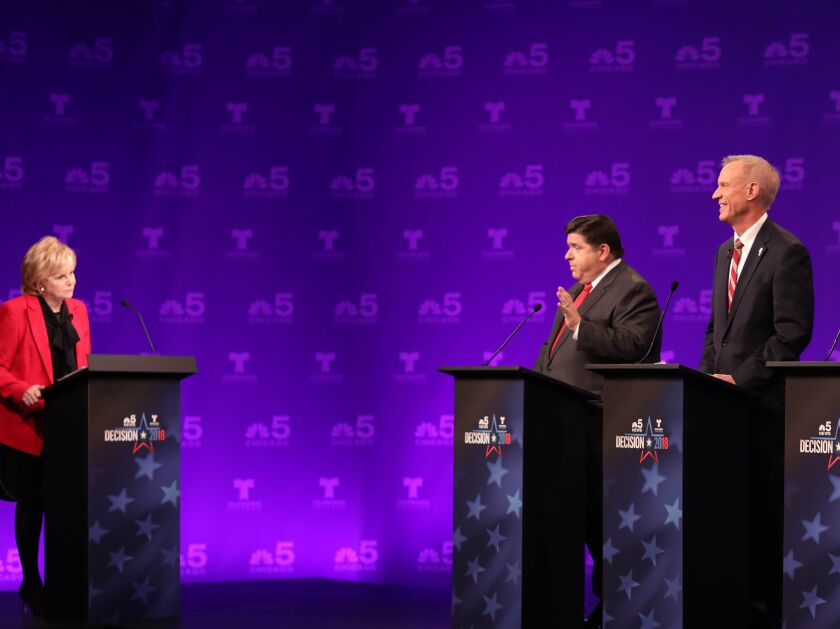 Carol Marin moderated a forum with , from left, Democratric candidate J.B. Pritzker and Republican Gov. Bruce Rauner. Libertarian candidate Kash Jackson and Conservative candidate Sam McCann were also present. | NBC Chicago