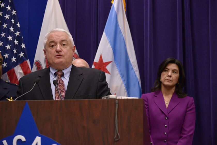 Eugene Roy, former Chicago police chief of detectives, with former State’s Attorney Anita Alvarez when both were still in those posts.