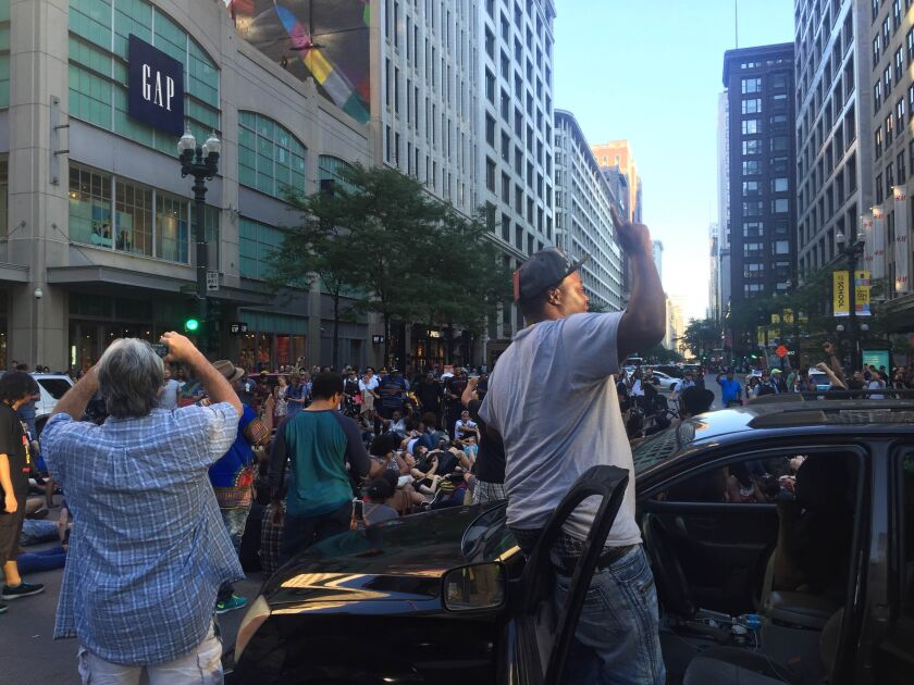 Marchers at State Street and Washington Street. | Mitchell Armentrout/Sun-Times