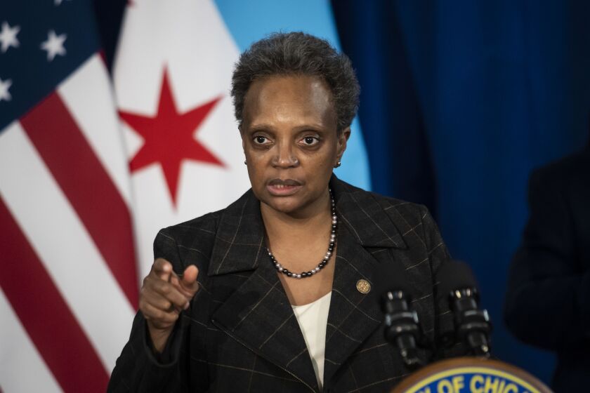 Mayor Lori Lightfoot speaks during a press conference at City Hall on Nov. 16, 2020.