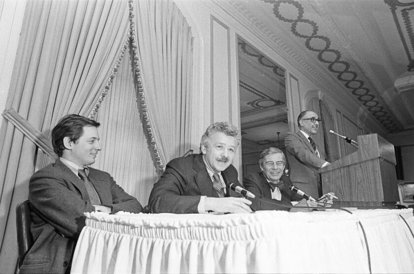 Sun Times columnists David Elliott, cultural features columnist; Basil Talbott Jr., political editor; and Edwin Darby, financial editor, discuss trends for the '80s at the Union League Club on Jan. 30, 1980.