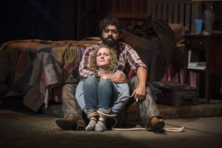 Mae (Caroline Neff) and Cowboy (Gabriel Ruiz) share a moment in Steppenwolf’s Chicago premiere production of “You Got Older” by Clare Barron. | Michael Brosilow