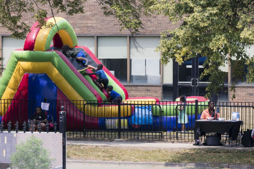 bouncy house kids Paint the Hood Orange