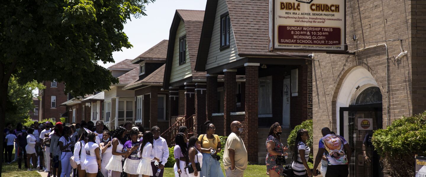 Hundreds of mourners wait in line to attend the funeral for 13-year-old Amaria Jones at Greater St. John Bible Church, 1256 N. Waller Ave., on the West Side, July 3, 2020.