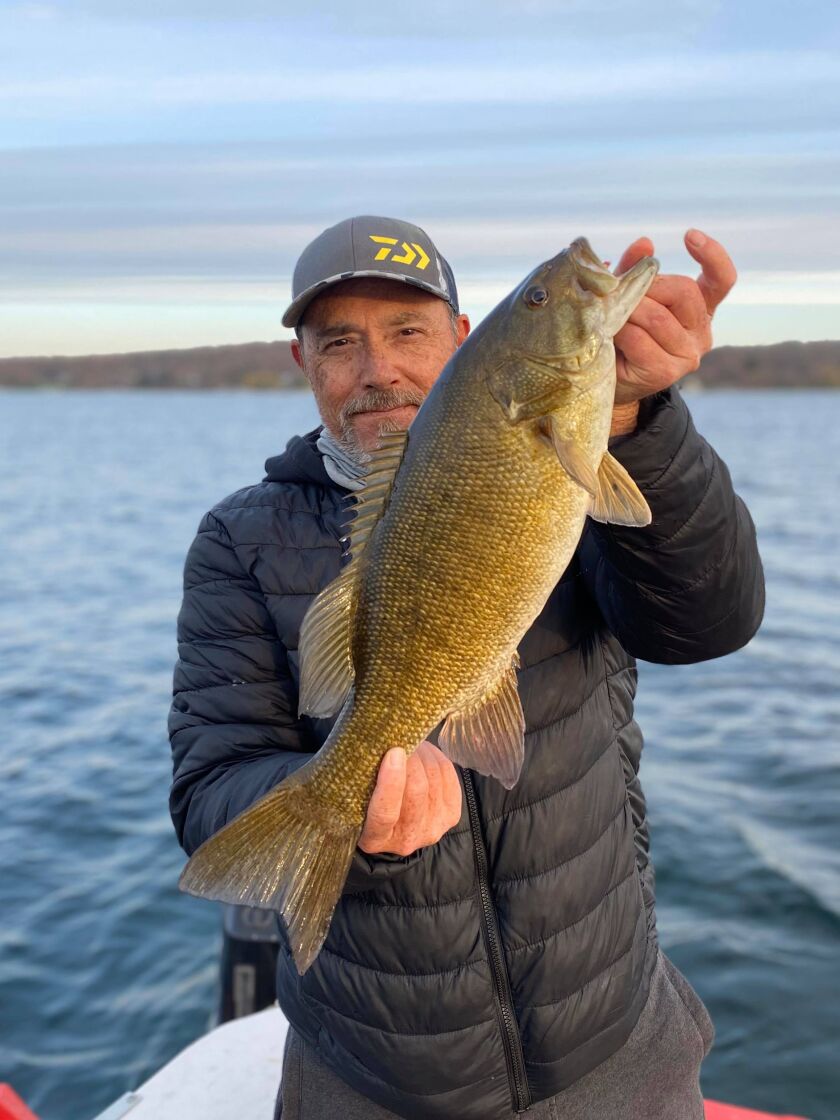 Dave Holmquist with a big Geneva Lake smallmouth bass. Provided photo