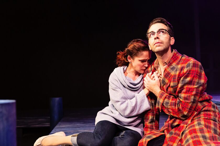 Kyrie Anderson and Tommy Thurston in a scene from BoHo Theatre’s production of “Big Fish.”