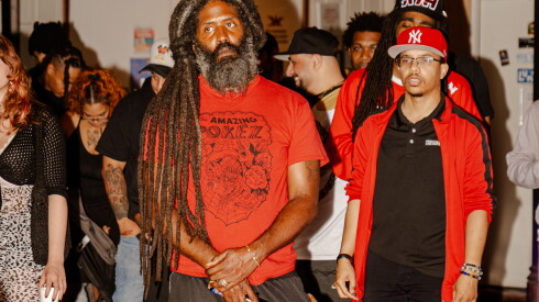 GoodWaves festival organizer and Los Angeles-based rapper MURS 3:16 (center).