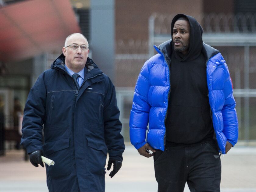 R. Kelly walks out of Cook County Jail with his defense attorney, Steve Greenberg, after posting $100,000 bail, Monday afternoon, Feb. 25, 2019. The R&B singer has entered a not guilty plea to all 10 counts of aggravated criminal sexual abuse. | Ashle