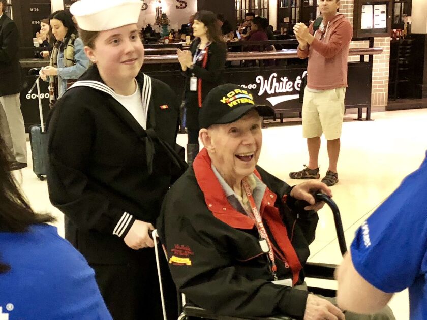 When our recent flight returned to Midway Airport, there were hundreds of volunteers waiting just past security to give this tired but happy planeload of veterans a hearty hometown welcome. | Provided photo