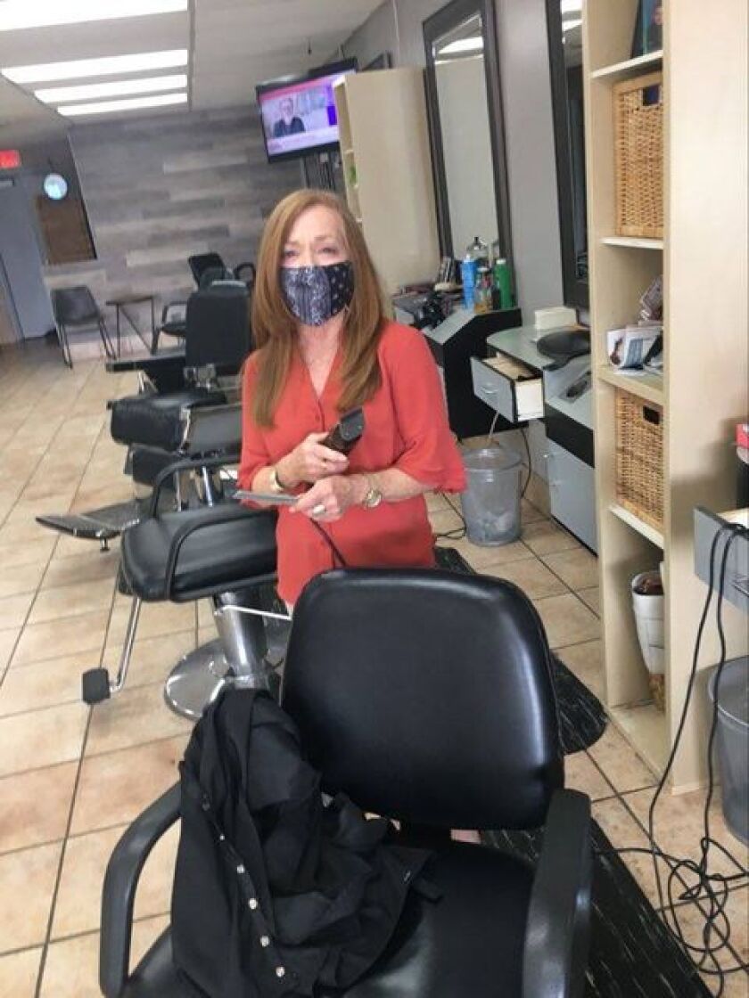 Candace Sanchez has worked at the same barbershop for 43 years. With no clients coming in, though, she might not be able to retire when she hoped to.
