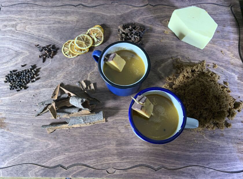 A hot buttered rum is displayed at the Queen of Hoxton bar in London. 