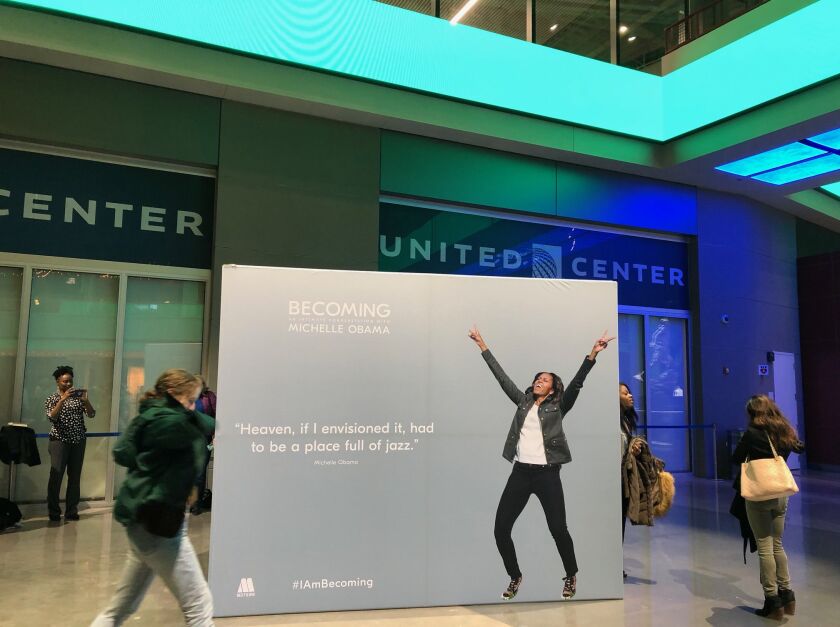United Center atrium visitors get a jazzy welcome from Michelle Obama Tuesday night, Nov. 13, 2018. | Lynn Sweet