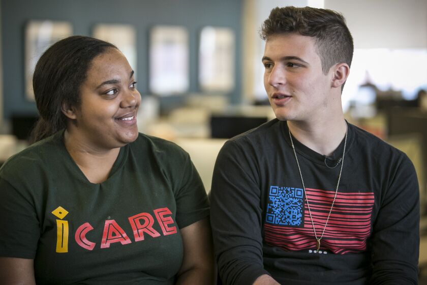 Trinity Cole-Reid, left, of Auburn-Gresham and Cameron Kasky said there’s a need to bring attention to the daily toll of gun violence in Chicago — in the same way the media covers one horrific act. | Rich Hein/Sun-Times