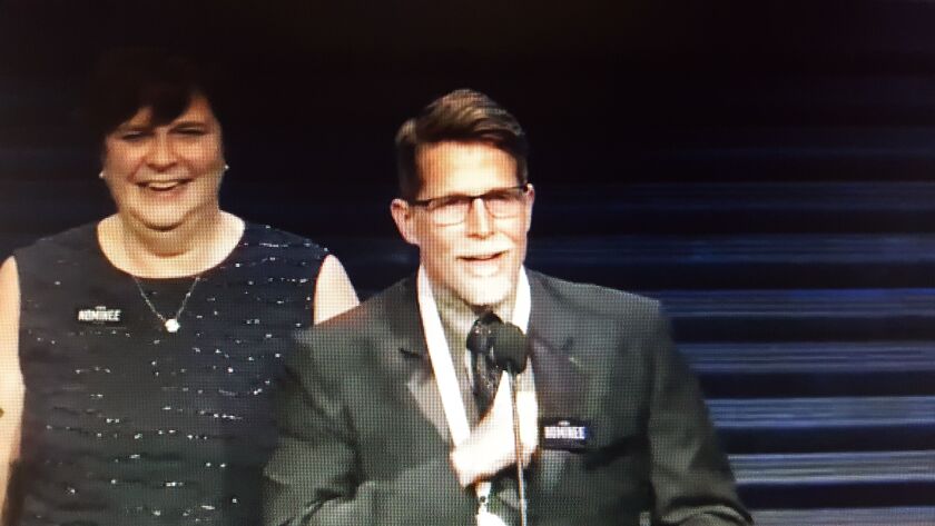 Chef Rick Bayless, joined on stage by his wife, Deann, accepts the 2017 James Beard Award for outstanding restaurant for his Chicago eatery Topolobampo, Monday night at the Civic Opera House.