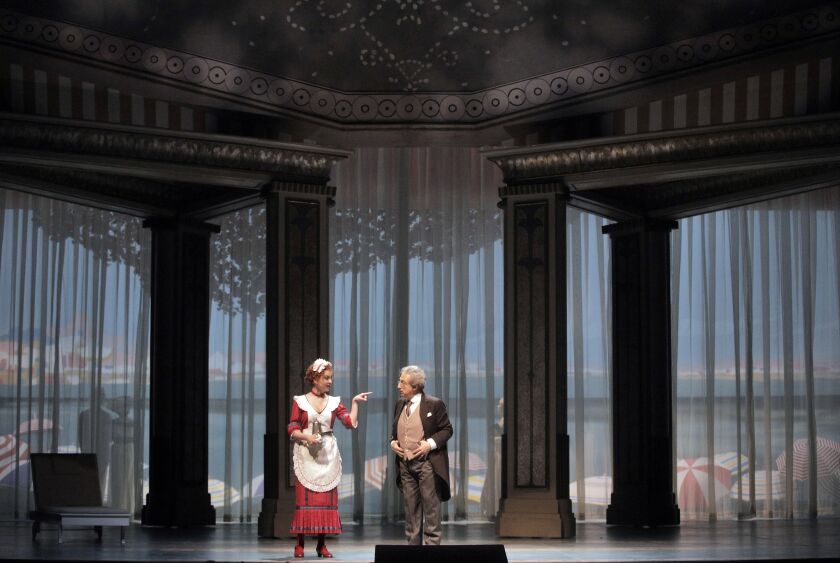 Despina (Elena Tsallagova) is an accomplice in the cons of Don Alfonso (Alessandro Corbelli) in “Così fan tutte.” | Cory Weaver photo