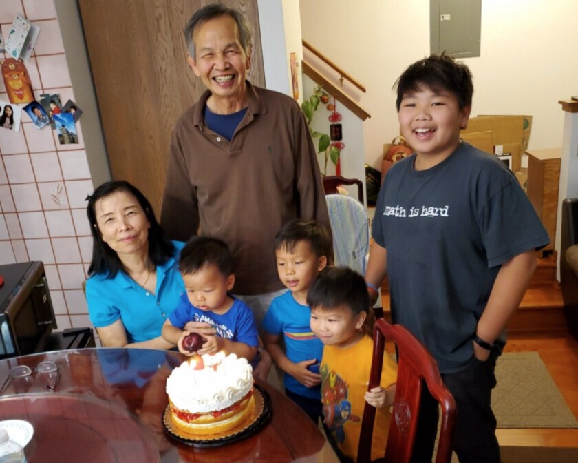 Woom Sing Tse and family