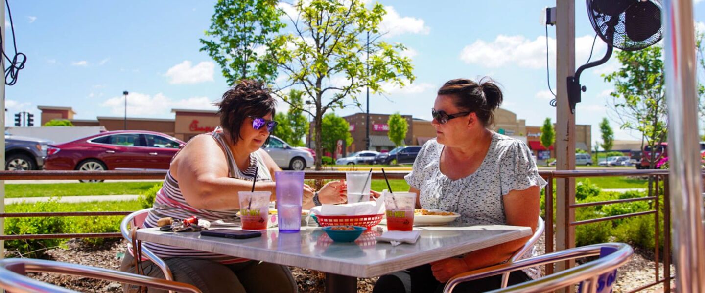 Diners at Chuy’s Fine Tex Mex in Orland Park took advantage of the nice weather and the loosened coronavirus restrictions to enjoy a meal on the patio without masks on Friday.