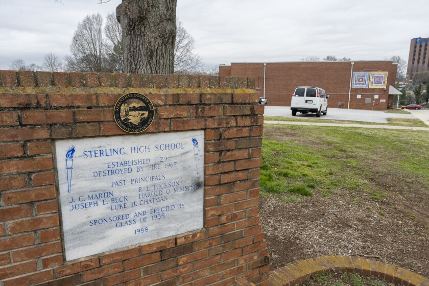 A plaque commemorates the old Sterling High School in Greenville, SC, outside what is now the Sterling Community Center.