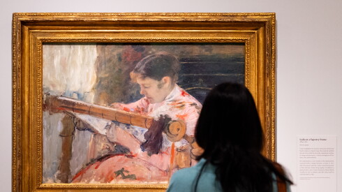 A woman views “Lydia at a Tapestry Frame” at the Art Institute of Chicago’s new Mary Cassatt exhibition, Monday, Sept. 7, 2026