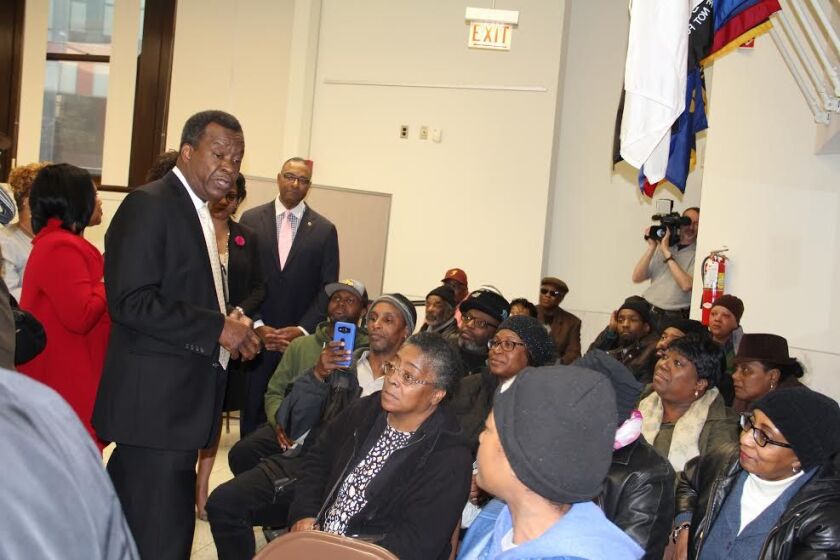 Philanthropist Willie Wilson talks to some of the dozens of Cook County homeowners whose taxes he paid on Thursday, deciding to gift them with the $1,000 payments he initially proposed as a no-interest loan. | Provided photo