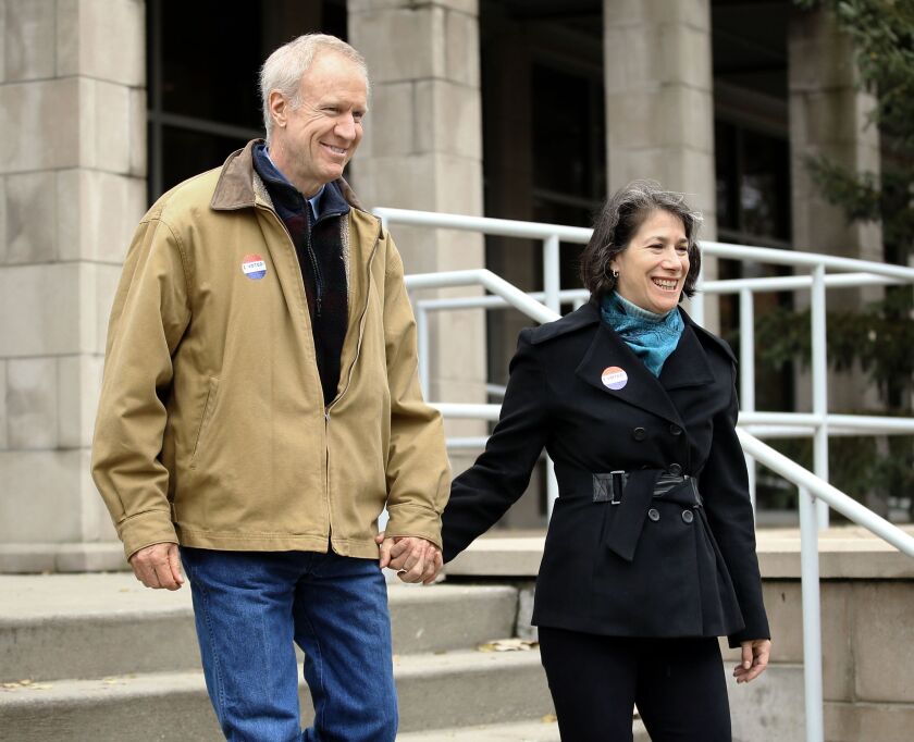 Gov. Bruce and Diana Rauner leave the Divine Mercy Parish Center after voting in Winnetka Tuesday November 6, 2018. | Kevin Tanaka/For the Sun Times