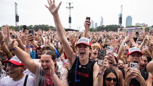 Fans dance and cheer as Slayyyter performs on the Bud Light stage on Day 2 of Lollapalooza in Grant Park, Friday, July 31, 2026.