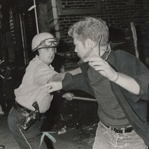 A policeman skirmished with demonstrator at Division and Wells, Aug 26, 1968, during the Democratic National Convention. | Sun-Times files