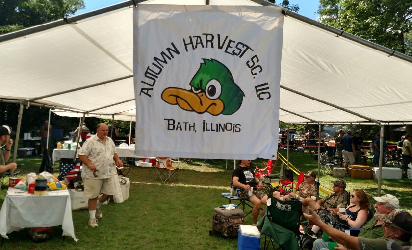 Frank Lemcke (left) working the tents of Autumn Harvest.<br>Credit: Dale Bowman