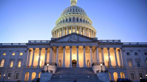The U.S. Capitol is seen at dusk in Washington, D.C. on Nov. 13. A government shutdown on Nov. 17 would deal a blow to our economy and to public trust in government, two University of Chicago experts write.