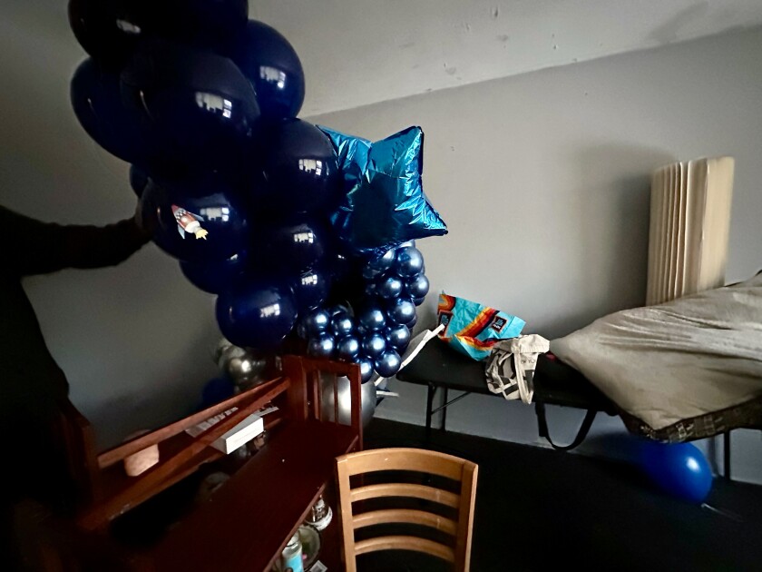 Balloons still filled the living room from a birthday party for one of the kids on the day the family moved out, just before the police showed up.