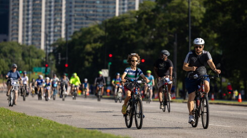 Cyclists bike near Grant Park along DuSable Lake Shore Drive during the 25th Annual Bike the Drive fundraiser.