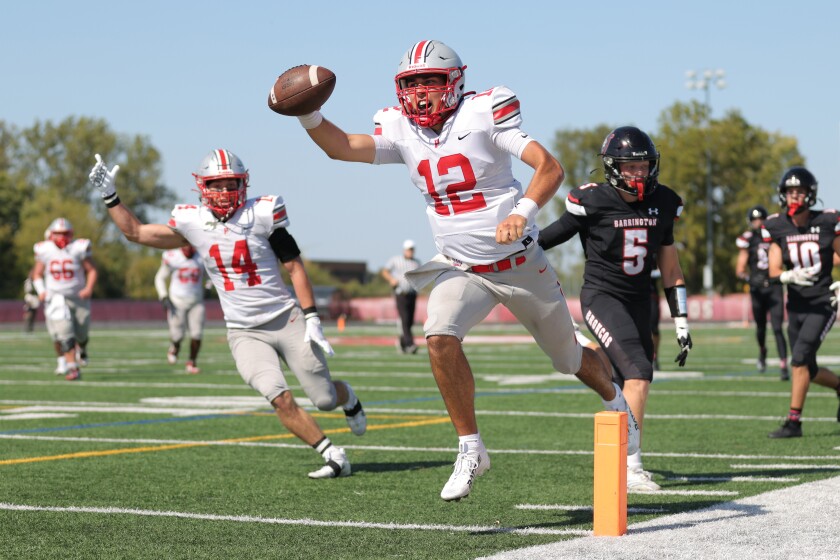 Palatine’s Will Santiago #12# scores a touchdown against Barrington, Saturday, Sept. 27, 2025.