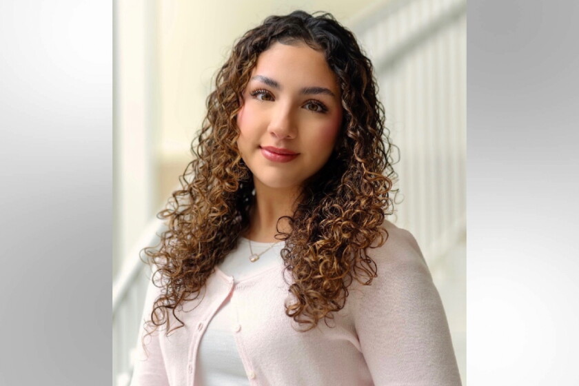 Emilia Mancero, a University of Illinois Urbana-Champaign senior, is involved in immigration advocacy but didn't know about a new law meant to protect immigrant students or how her college had complied with it.