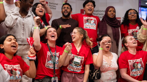 Rush nurses cheer as a successful union vote is announced at a National Nurses Organizing Committee rally at Billy Goat Tavern in West Loop.