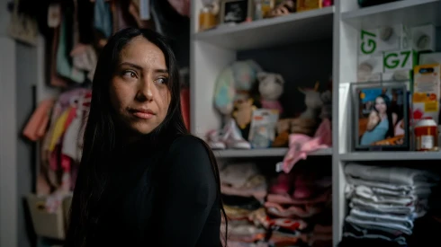 Nayra Guzmán, a 22-year-old immigrant from Mexico and new mother, stands for a portrait in her home on November 24, 2025, in Cicero, Illinois. She was detained 15 days after giving birth while her daughter remained in the NICU.
